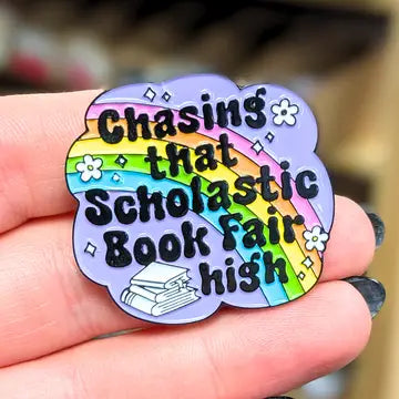 CHASING THAT SCHOLASTIC BOOK FAIR HIGH ENAMEL PIN