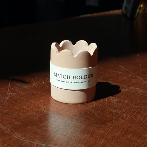 SCALLOPED MATCH POT WITH MATCH STRIKER